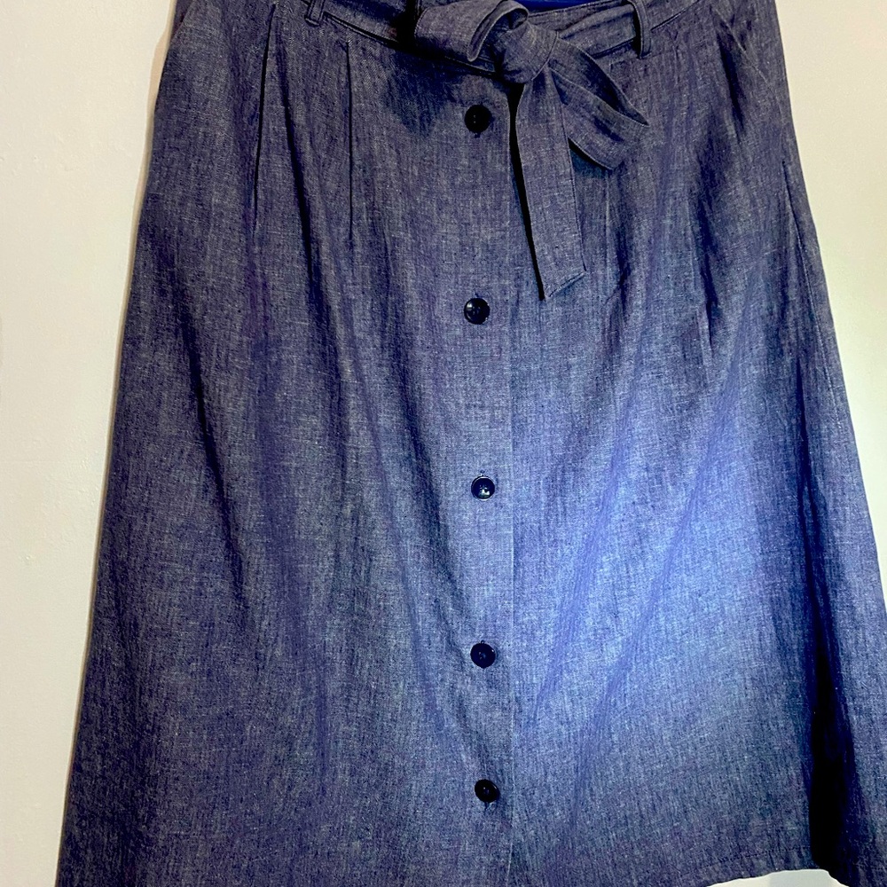 Indigo front button pleated skirt with pockets